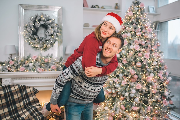 A young couple celebrating the holiday at home