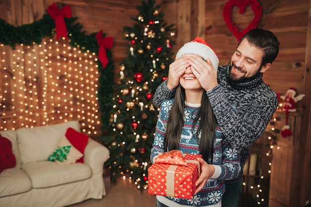 A young couple celebrating the holiday at home