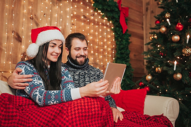 A young couple celebrating the holiday at home