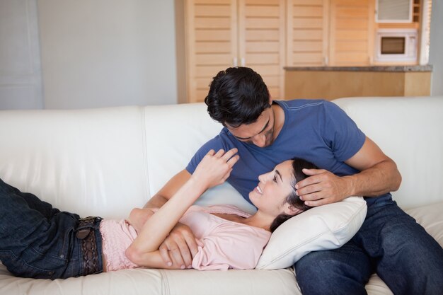 Young couple cuddling each other