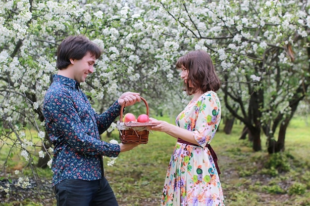 Young couple on date in spring park outdoor