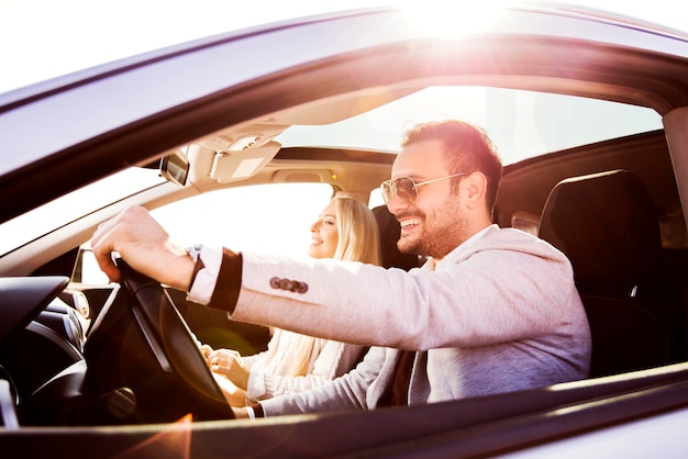 Young couple enjoying the drive