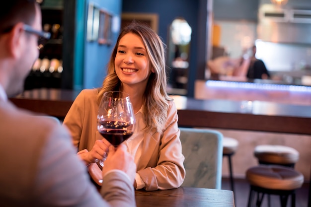 Young couple enjoying lunch in the restaurant