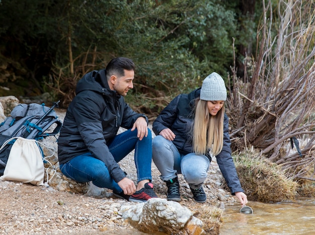 young couple exploring nature