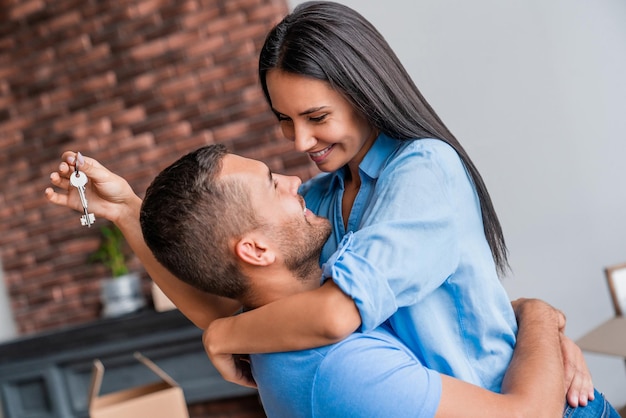 Young couple feeling happy for buying new house