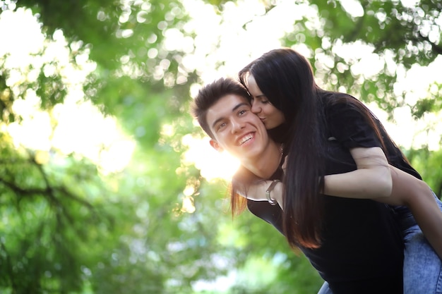 Young couple on the first date in the city park