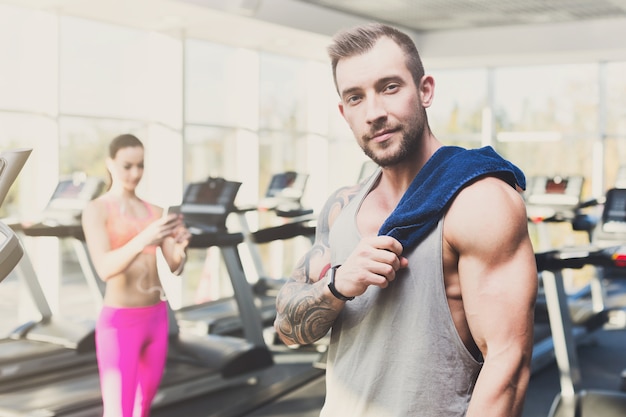 Young couple in fitness club