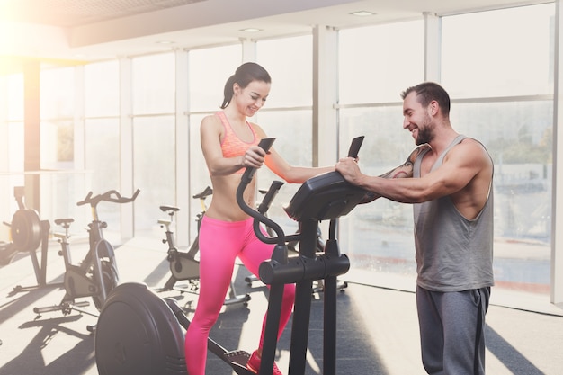 Young couple in fitness club