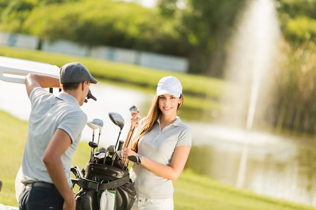 Young couple at golf court