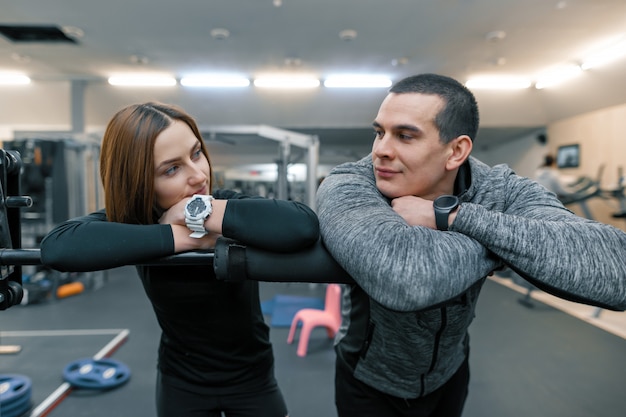 Young couple in the gym