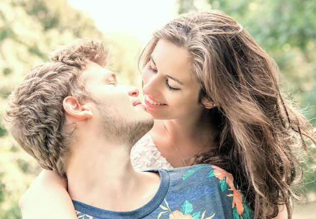 Young couple has fun in the park