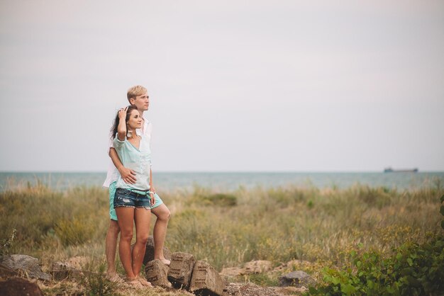 Young couple have fun on summer day at the beach