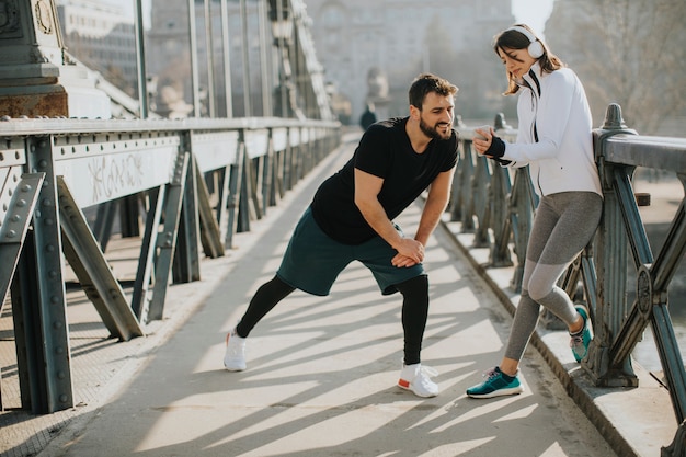 Young couple have training in urban enviroment