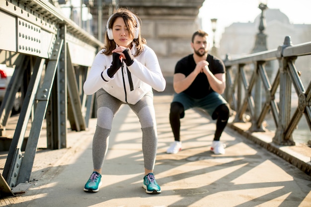 Young couple have training in urban enviroment