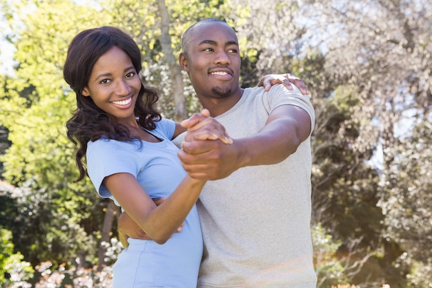 Young couple having fun and dancing