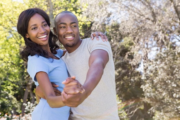 Young couple having fun and dancing