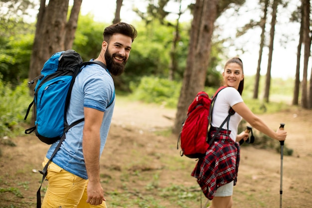 Young couple hiking in mountain