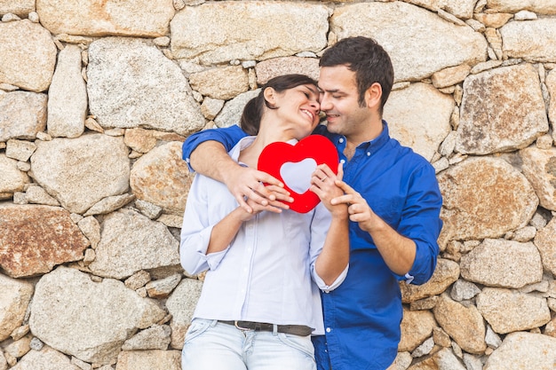 Young couple hugging and enjoying spending time together in the village