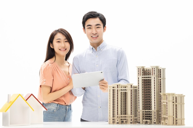 Young couple is choosing residential property