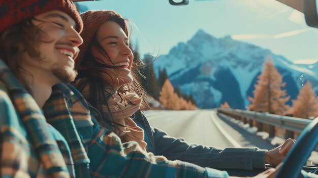 Photo young couple is driving in the mountains they are happy and smiling the sun is shining and the sky is blue