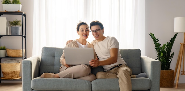 Young couple is using laptop