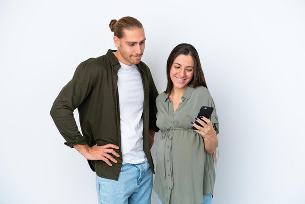 Young Couple over isolated background