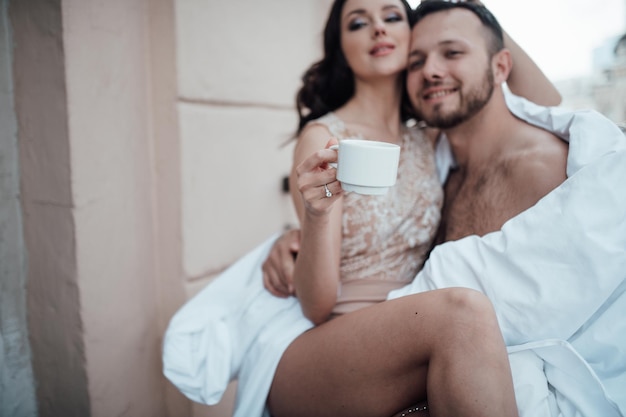 Photo young couple kissing