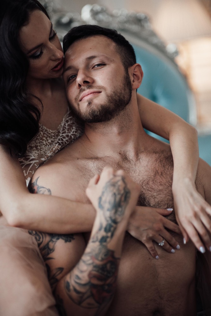 Photo young couple kissing
