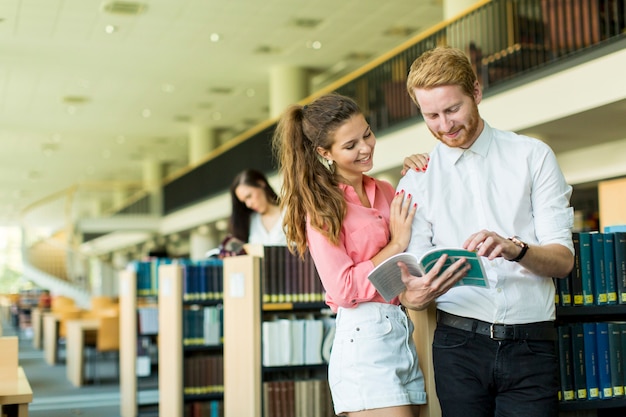 Young couple in the library