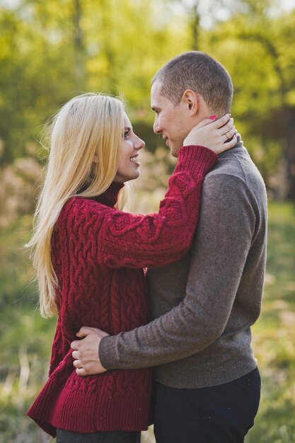 A young couple in love embracing against the background of reeds 1352