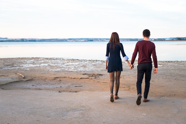 Young couple in love, man and girl in outdoor