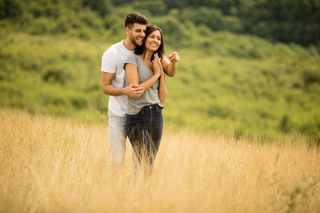 young couple in love outside in spring nature