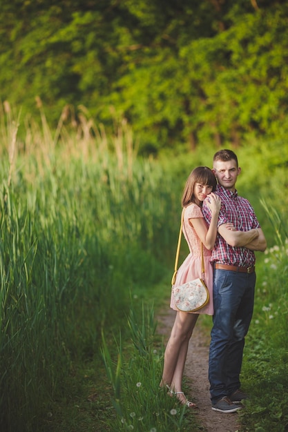 Young couple in love together on nature