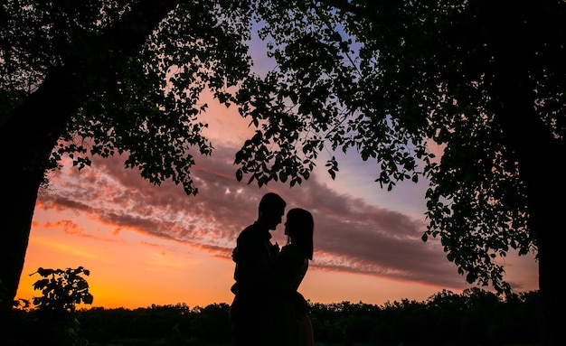 Young couple in love together on nature