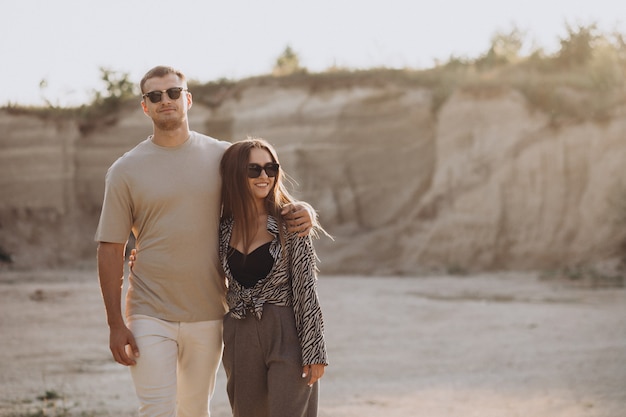 Young couple in love together in quarry