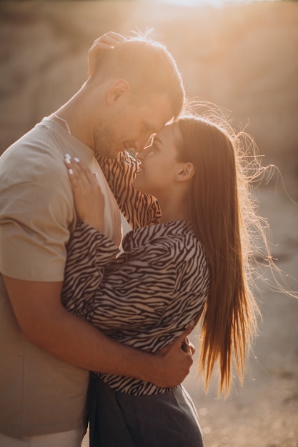 Young couple in love together in quarry