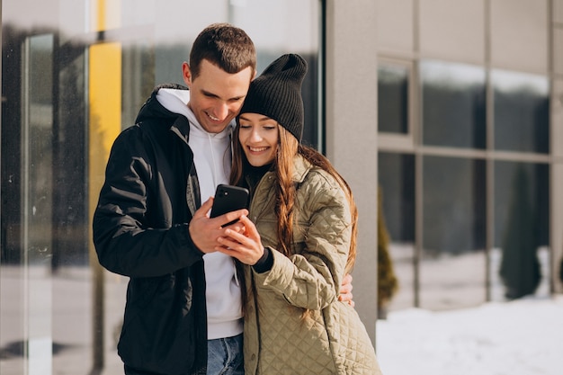 Young couple in love walking in winter time