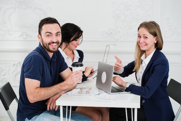 Young couple meeting architect for future house