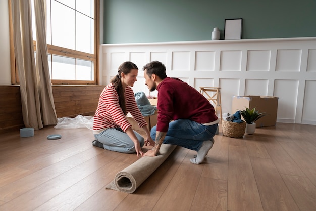 Young couple moving into a new home