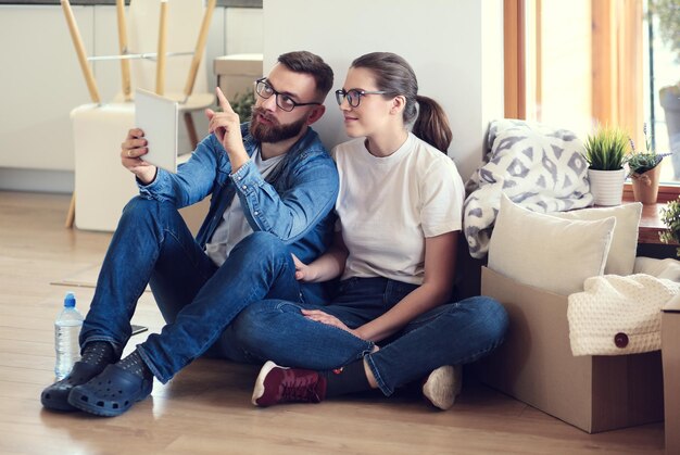 Young couple moving in to new home together