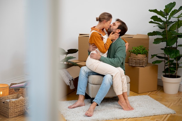 Young couple moving in new home