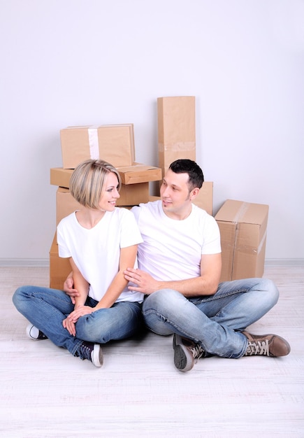 Young couple moving in new house