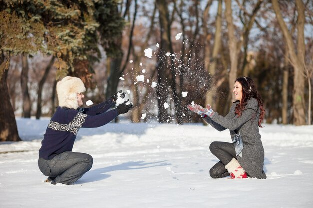 Young couple in a park in winter