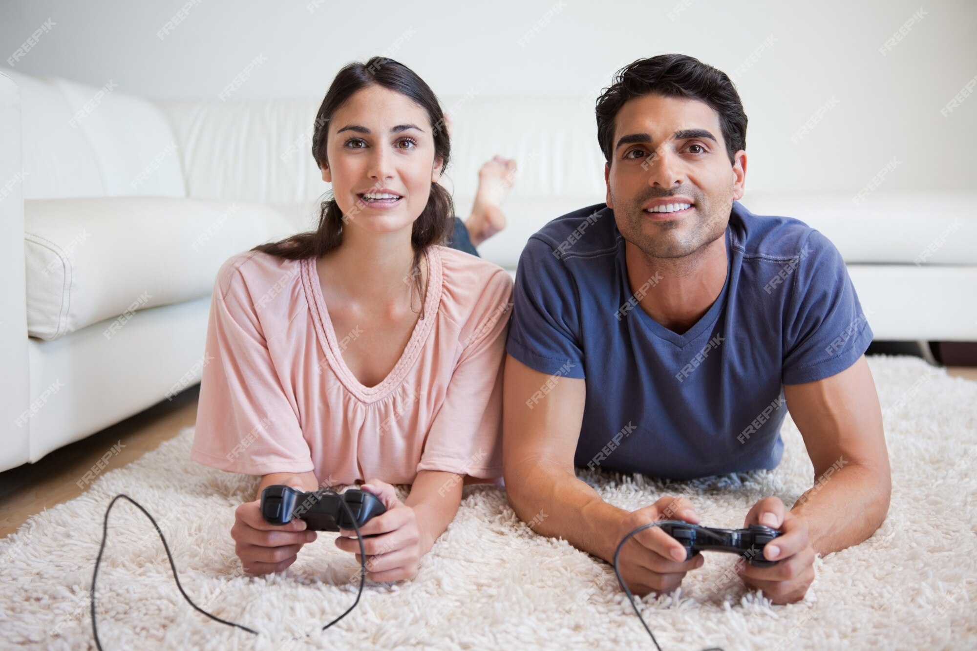 Young Cute Competitive Boyfriend Girlfriend Playing Video Games In Couch  Stock Photo, Picture and Royalty Free Image. Image 34313215.