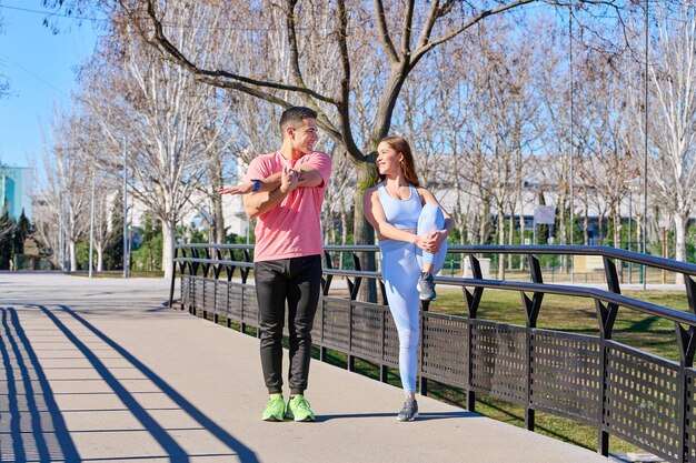 Young couple practicing sports outdoors