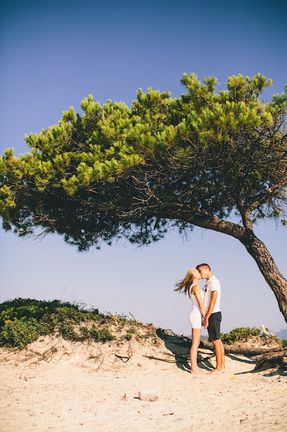 Young couple relaxing on the beach