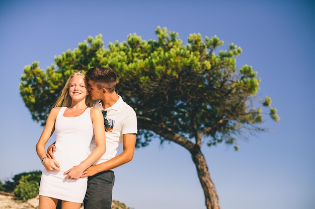 Young couple relaxing on the beach