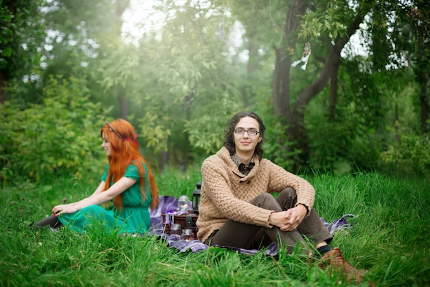 Young couple resting at the nature outdoors