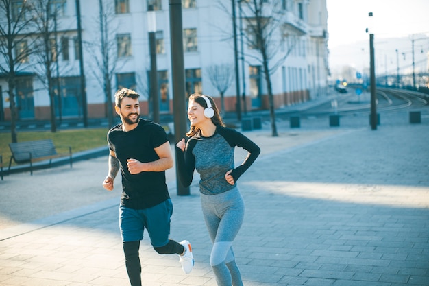 Young couple running in the morning