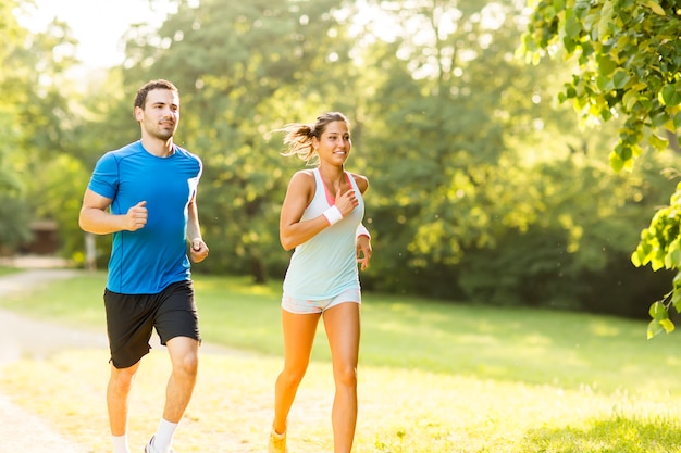 Young couple running